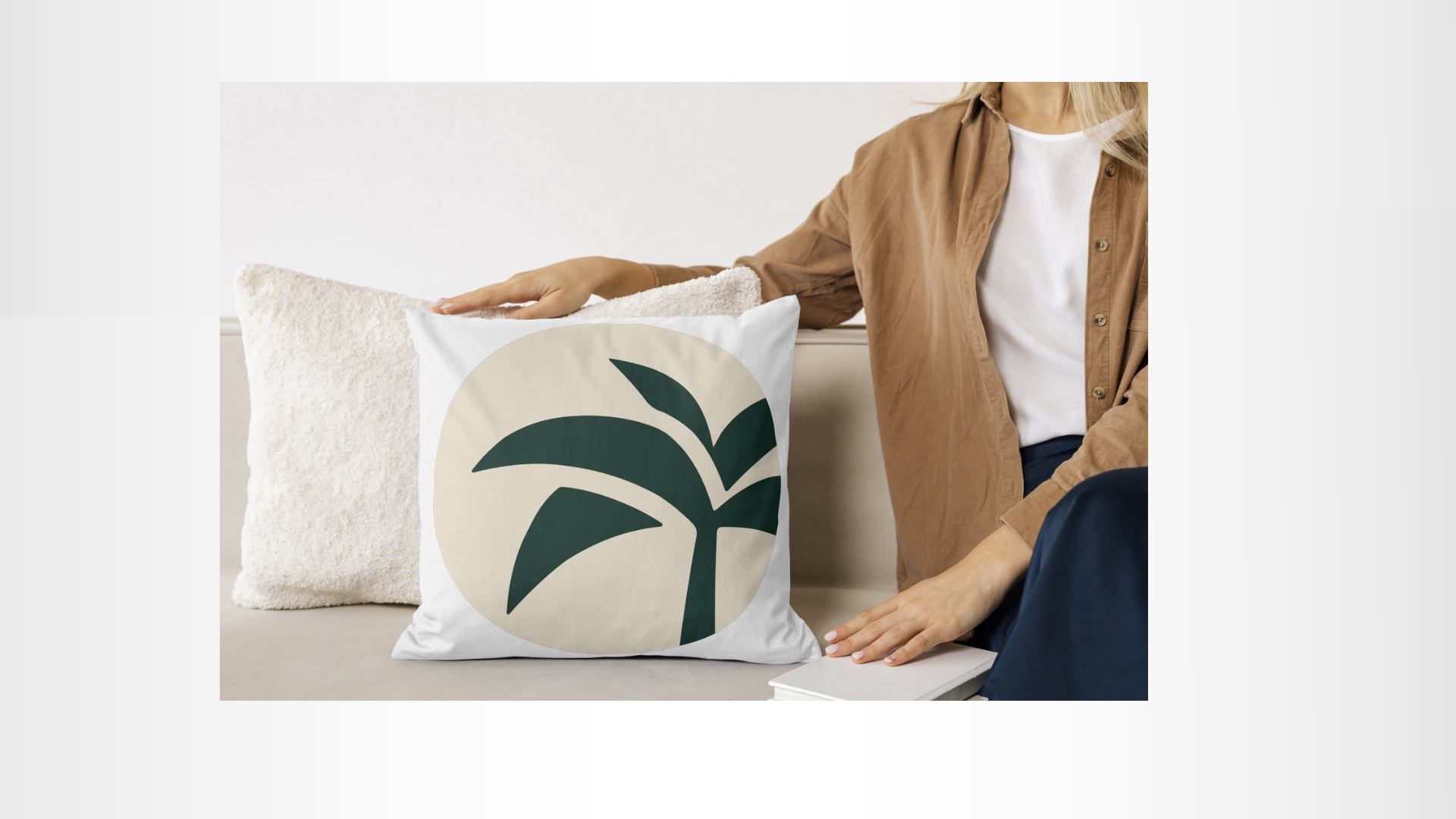 Tropical Luxe pillow on neutral sofa